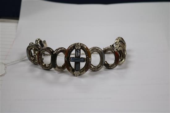 A late Victorian engraved silver and inset Scottish hardstone oval link bracelet.